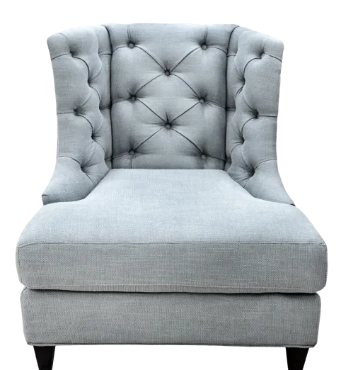 An upholstered dining chair on a tapered oak frame